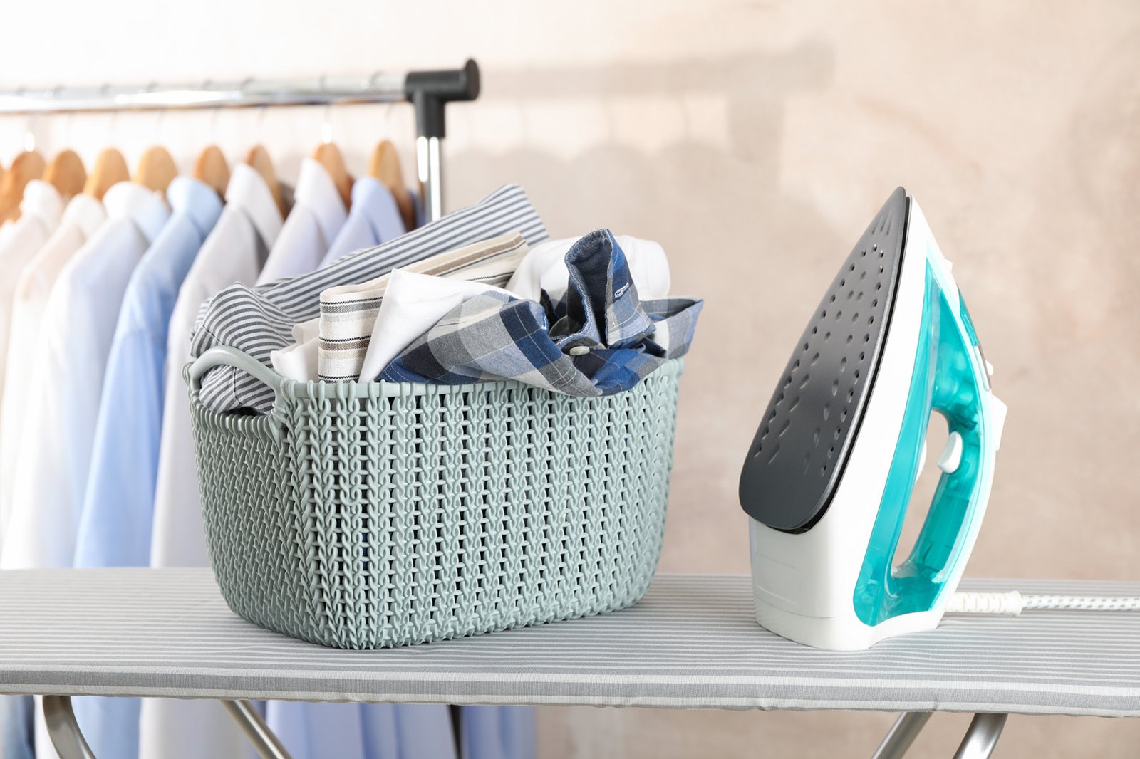 rental housewares package that includes and iron and ironing board and laundry basket for rent